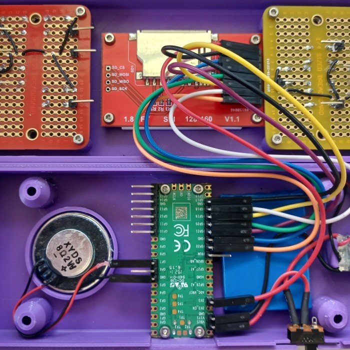 The front and back cases with just the LCD wired up